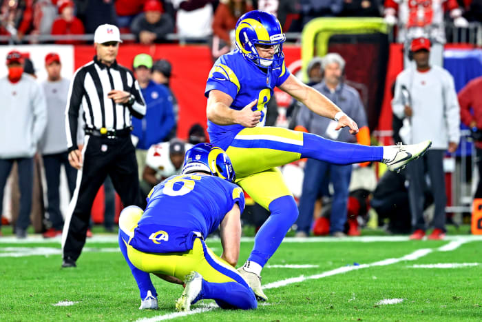 Jan 23, 2022; Tampa, Florida, USA; Los Angeles Rams kicker Matt Gay (8) kicks the game winning field goal during the second half against the Tampa Bay Buccaneers in a NFC Divisional playoff football game at Raymond James Stadium. Mandatory Credit: Kim Klement-USA TODAY Sports